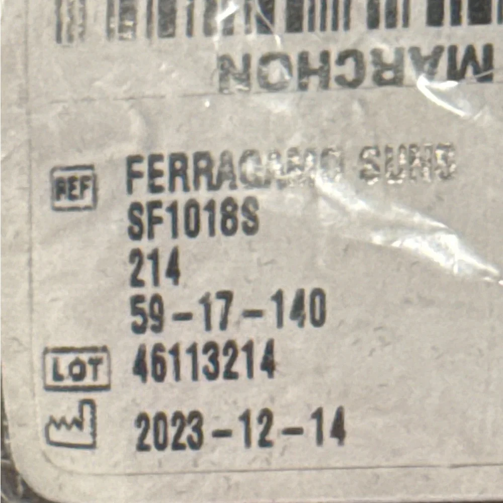 Salvatore Ferragamo Tortoise Sunglasses with SF Logo at Temples.